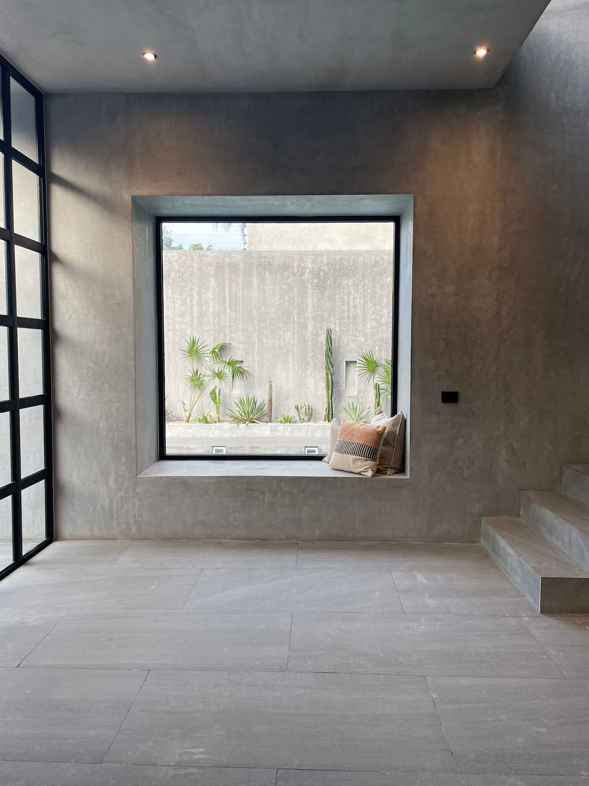 Casa Arroqueno stylish polished concrete interiors with modern kitchen and minimalist design