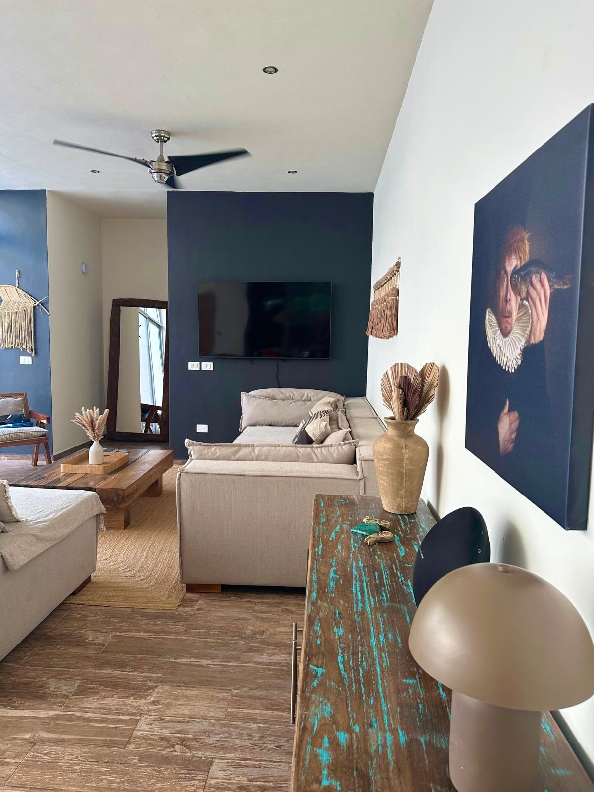 Casa Flamingo spacious living room with designer furnishings and natural light in Tulum rental home