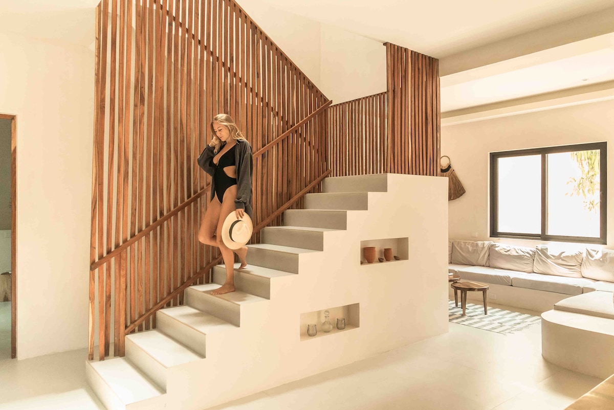 Casa Tabarka contemporary living space with designer furnishings in 4-bedroom jungle house rental